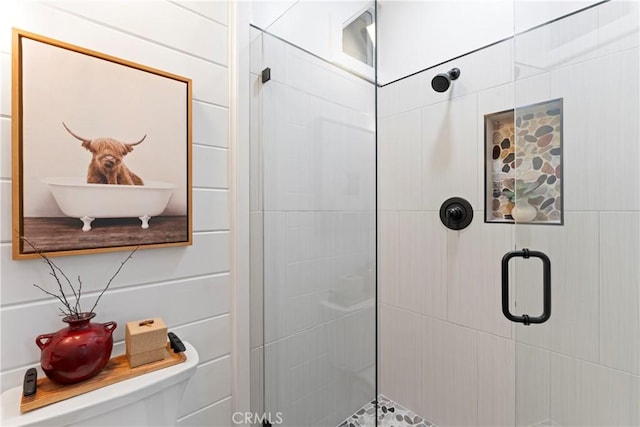 bathroom featuring an enclosed shower