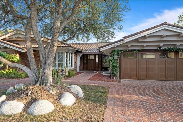 view of front of home with a garage