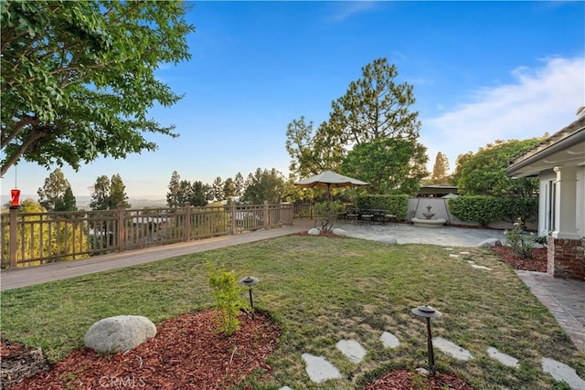 view of yard with a patio area and fence