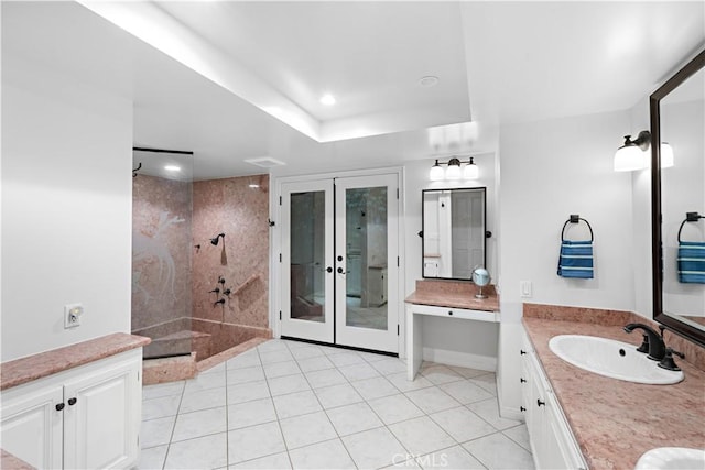 full bathroom featuring double vanity, walk in shower, french doors, a sink, and recessed lighting