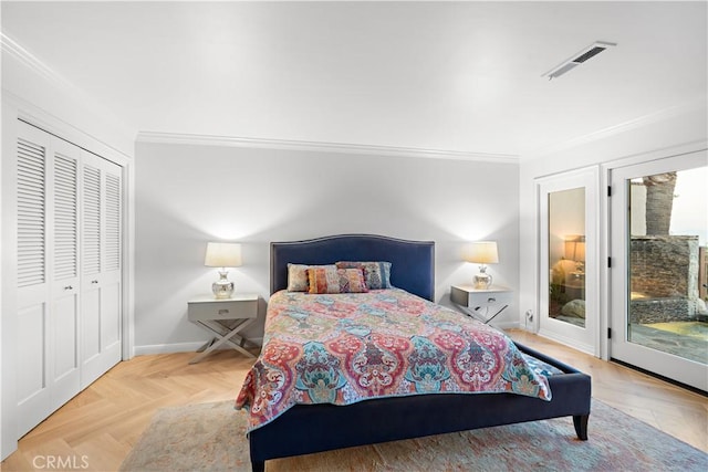 bedroom with ornamental molding, access to exterior, and a closet