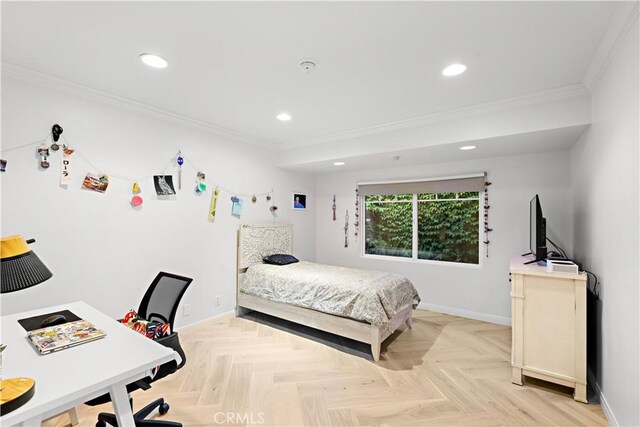 bedroom featuring ornamental molding and light parquet flooring