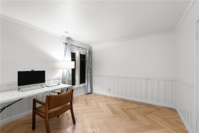 office featuring a wainscoted wall and crown molding