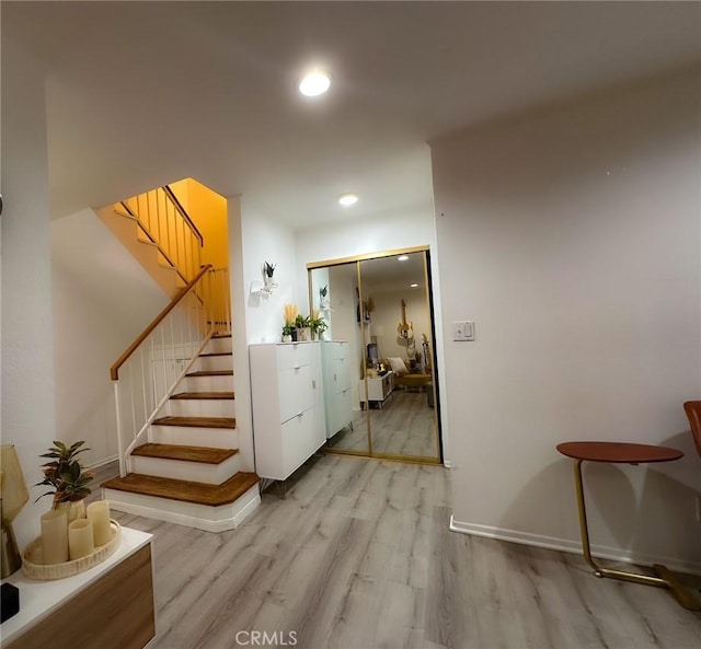 corridor featuring light hardwood / wood-style flooring