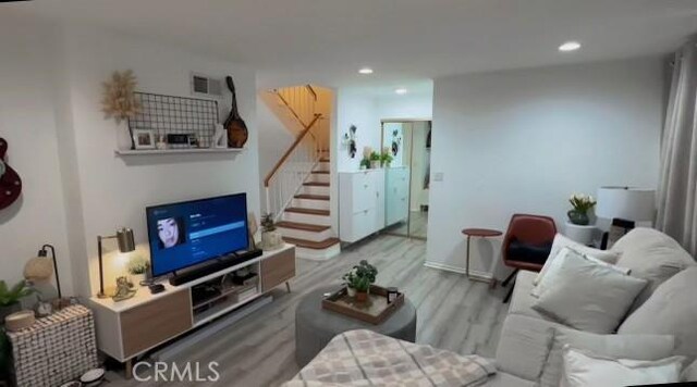 living room featuring light wood-type flooring