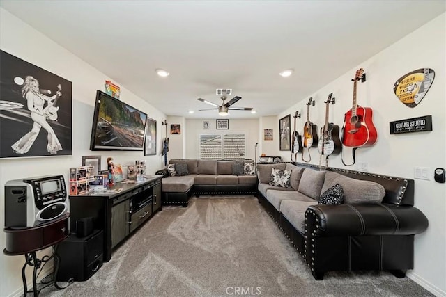 carpeted living room featuring ceiling fan