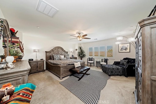 bedroom featuring ceiling fan and light colored carpet