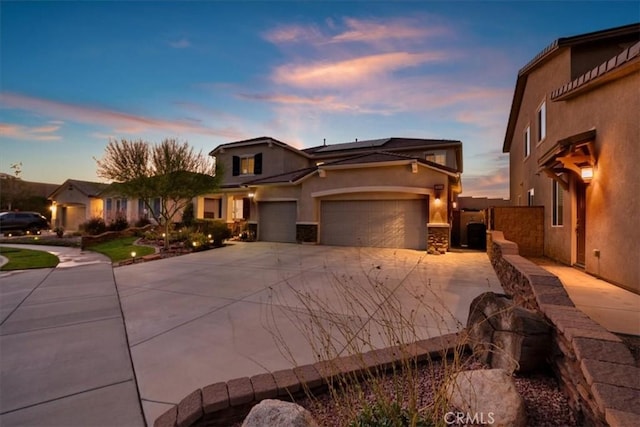 view of front of home with a garage