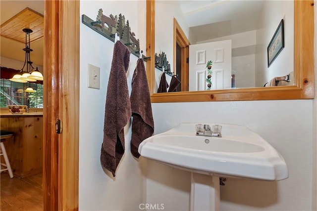 bathroom featuring hardwood / wood-style floors and sink