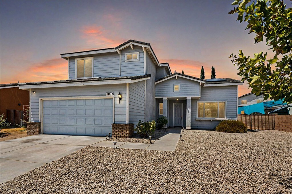 front of property featuring a garage