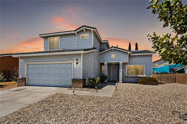 front of property featuring a garage