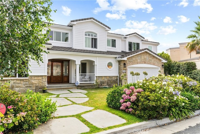 view of front of house featuring a front lawn and a porch