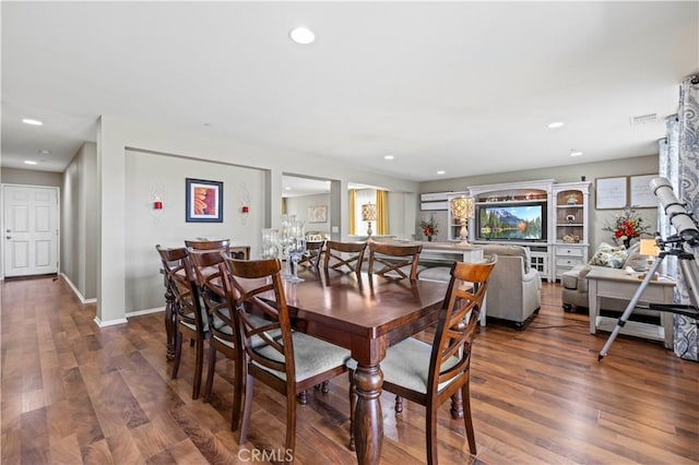 dining room featuring dark wood-type flooring