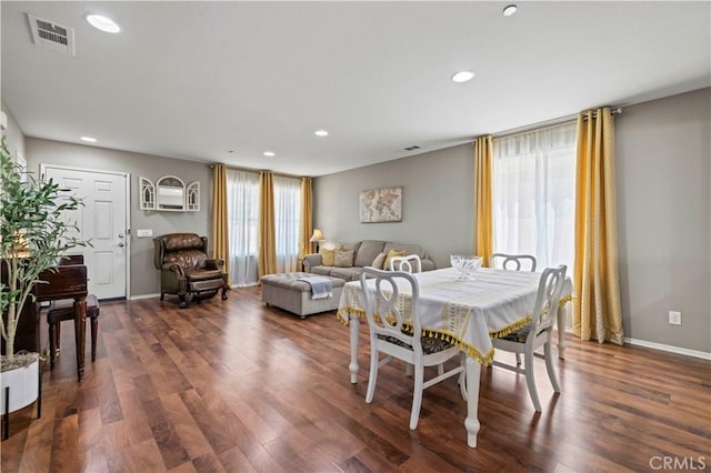 dining room featuring dark wood-type flooring