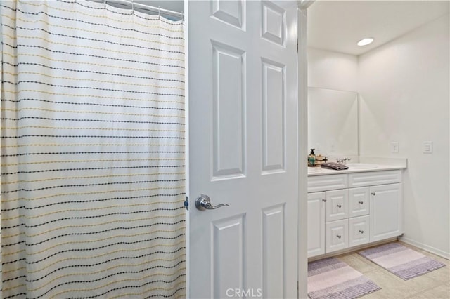 bathroom featuring vanity and walk in shower