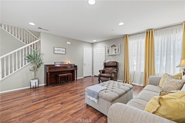 living room featuring dark hardwood / wood-style floors