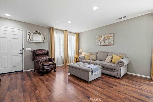 living room featuring dark hardwood / wood-style floors