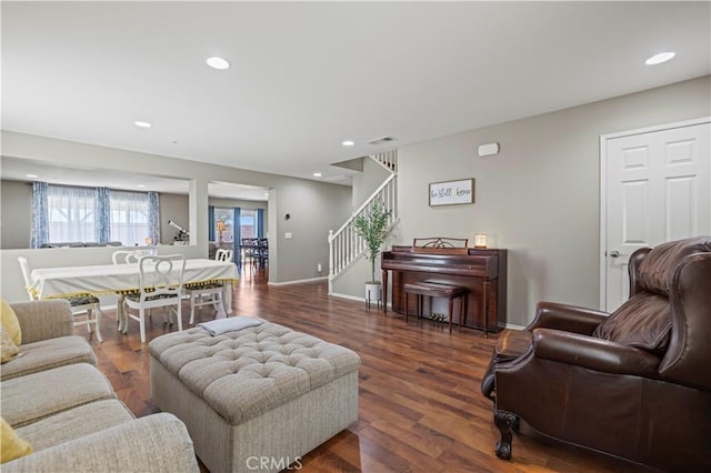 living room featuring dark hardwood / wood-style floors