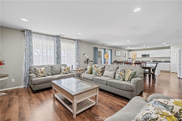 living room with hardwood / wood-style flooring