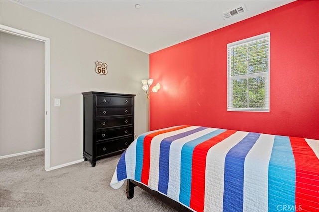 bedroom with light colored carpet