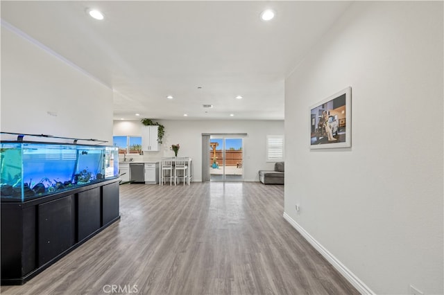 living room with light hardwood / wood-style flooring