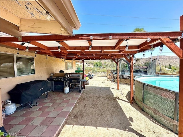 view of patio with a trampoline