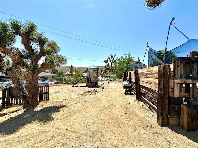 view of yard with a playground