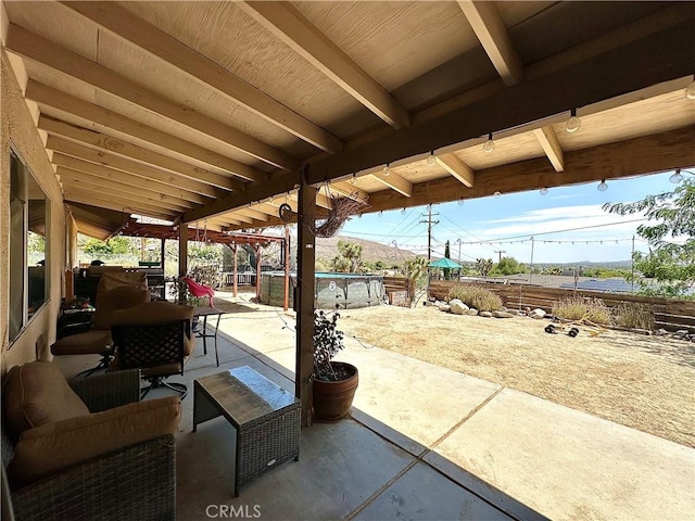 view of patio featuring a pool and outdoor lounge area