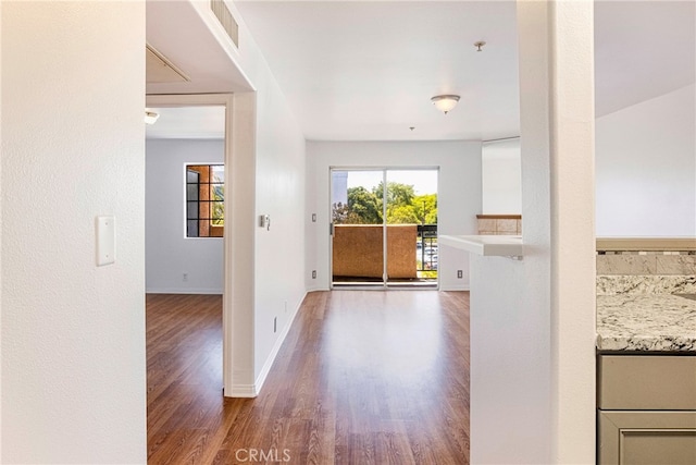 interior space with hardwood / wood-style floors