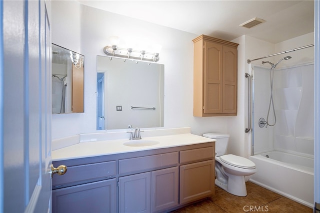 full bathroom with tile patterned floors, shower / washtub combination, vanity, and toilet