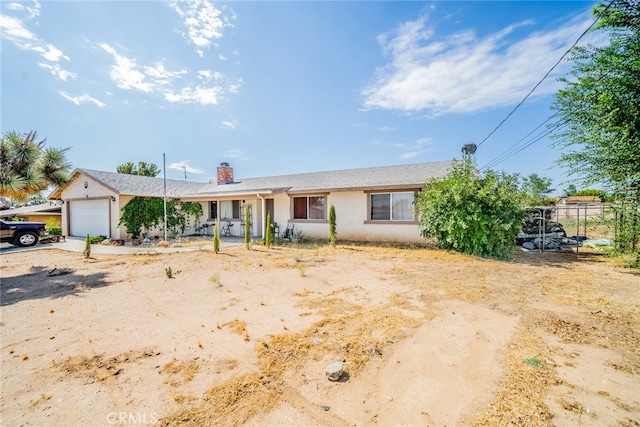 single story home with a garage