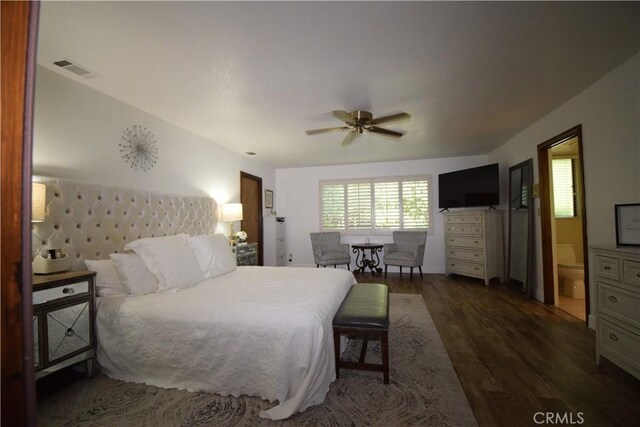 bedroom with ceiling fan and dark hardwood / wood-style flooring