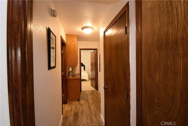 hall featuring light wood-type flooring