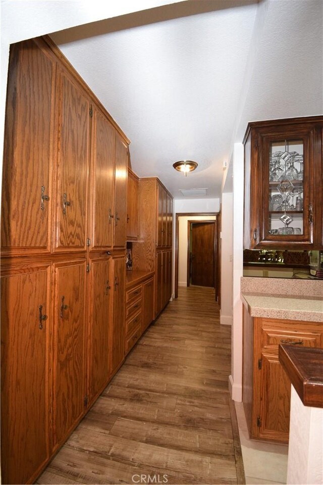 corridor featuring light hardwood / wood-style flooring