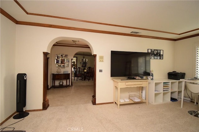 office area featuring crown molding and light carpet