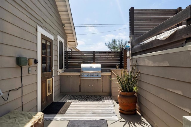 view of patio featuring area for grilling and grilling area