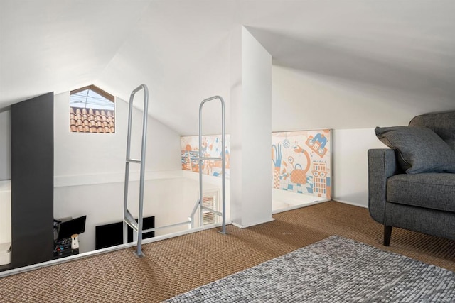 sitting room featuring lofted ceiling and carpet floors