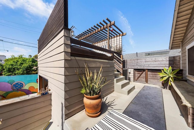 view of side of home featuring a pergola