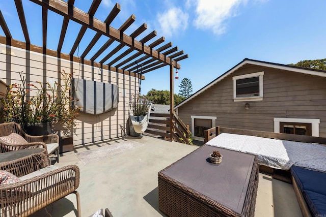 view of patio with outdoor lounge area and a pergola