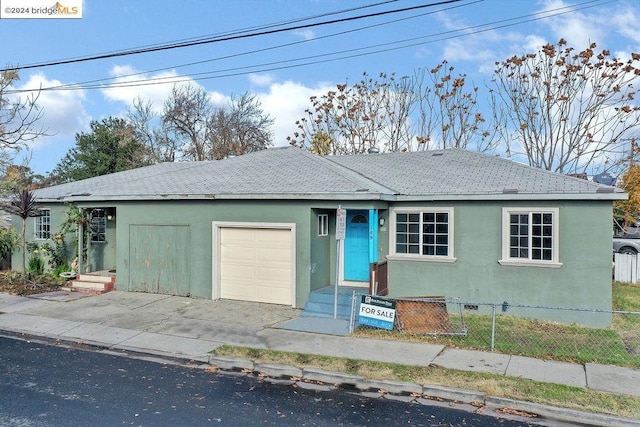 view of front of house with a garage