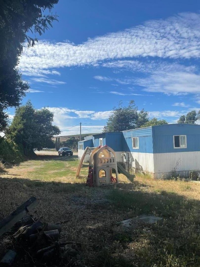 view of yard with a playground