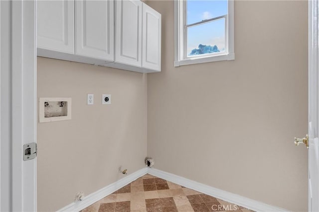 clothes washing area with hookup for a gas dryer, cabinets, washer hookup, and hookup for an electric dryer