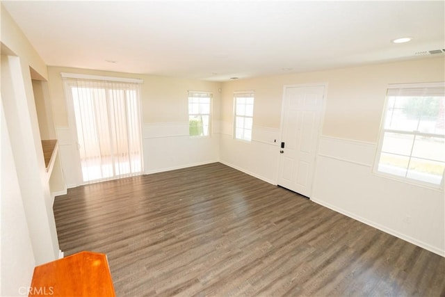 unfurnished room featuring dark hardwood / wood-style floors