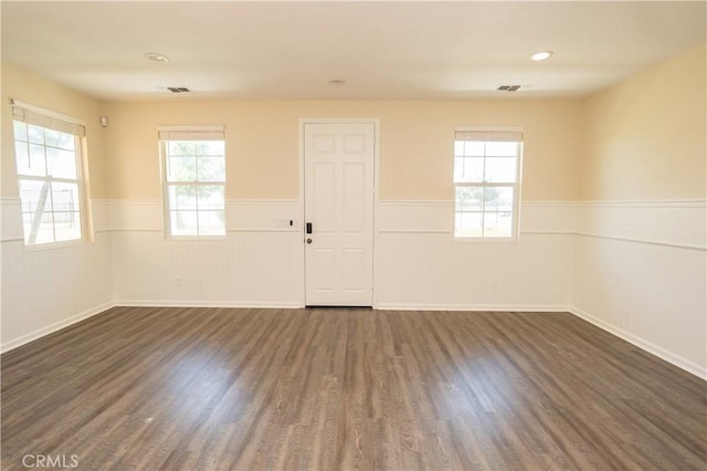 empty room featuring dark hardwood / wood-style floors