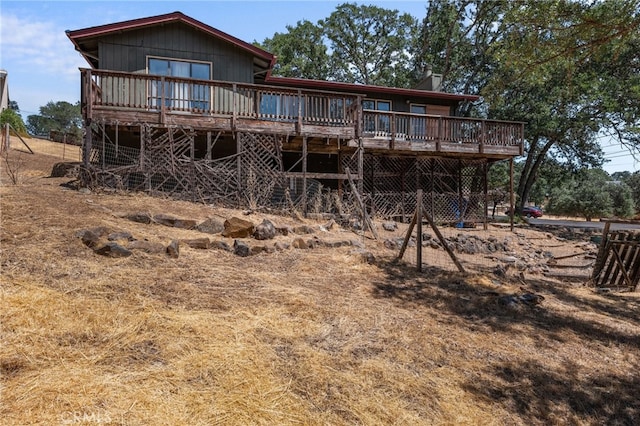 rear view of property with a deck