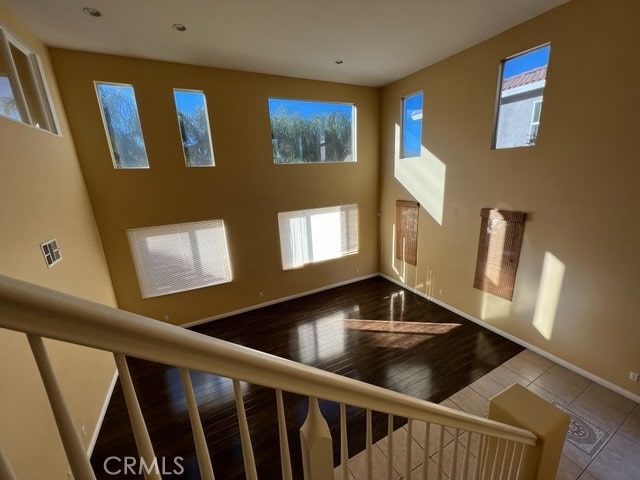 foyer entrance featuring a wealth of natural light and hardwood / wood-style floors