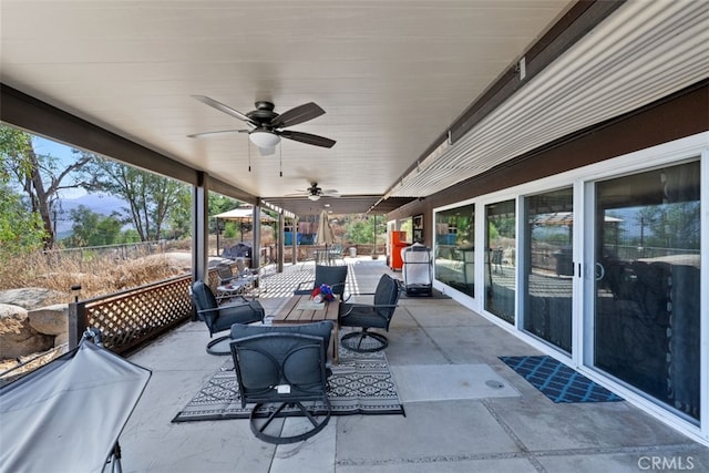 view of patio featuring ceiling fan