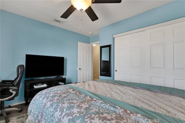 bedroom with a closet and ceiling fan