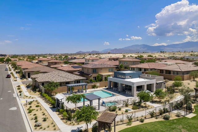 drone / aerial view featuring a mountain view