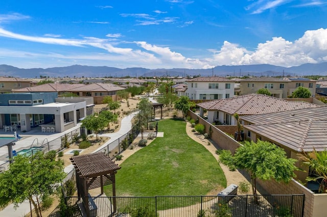 birds eye view of property featuring a mountain view